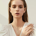 Collier initial en moissanite