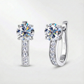 Boucles d’oreilles créoles avec moissanite sertie en canal